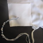 Tzitzit tucked in or showing?