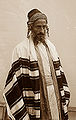Jew with simonim and wrapped in Yemenite tallith