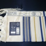 Tallit with blue and gold striping
