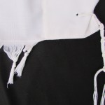 Machine-spun tzitzit strings