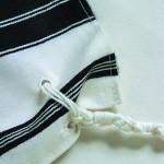 Chabad tzitzis holes
